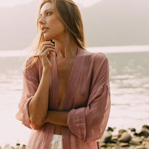 Close up of Model wearing sheer silk robe natural fabrics made in Vancouver