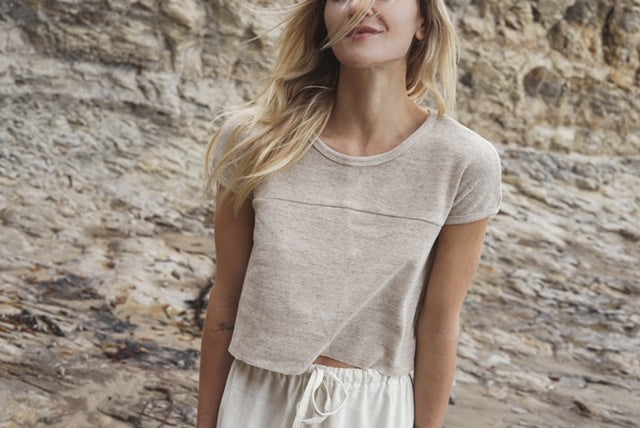 Model wearing Limited edition tees are made from reclaimed textiles. Sourced natural sustainable fibres
